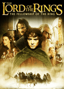 Frodo holding the One Ring, symbolizing the epic journey that defined modern fantasy filmmaking.