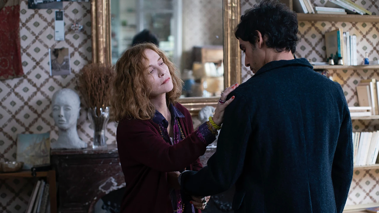 Parallel Tales Cannes Film Festival Screenings Review Roundup image featuring Isabelle Huppert and Adam Bessa in Asghar Farhadi’s French drama Histoires Parallèles.
