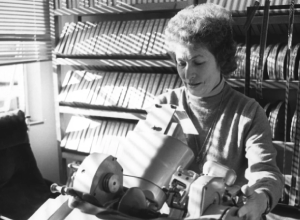 Anne V. Coates working in a film editing room during her career as an Academy Award-winning British film editor.
