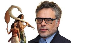 Moana Live-Action Cast Guide: Every Main Character and Who Played Them in the Original Animated Movie 6 Close-up portrait of a man wearing black-framed glasses alongside two fantasy characters holding oversized wooden paddles against a white background, representing a film-related story.