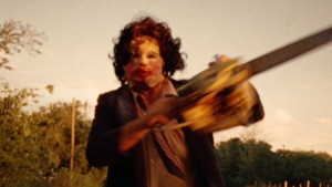 Why Horror Has Always Found Its Natural Home in Theatres 3 Leatherface with a chainsaw in The Texas Chainsaw Massacre (1974), one of cinema's most influential horror movies and a defining theatrical horror experience.